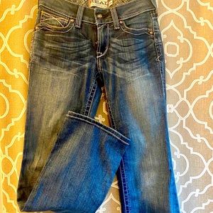 Ariat R.E.A.L. Mid-rise Whipstitch boot cut jeans.
